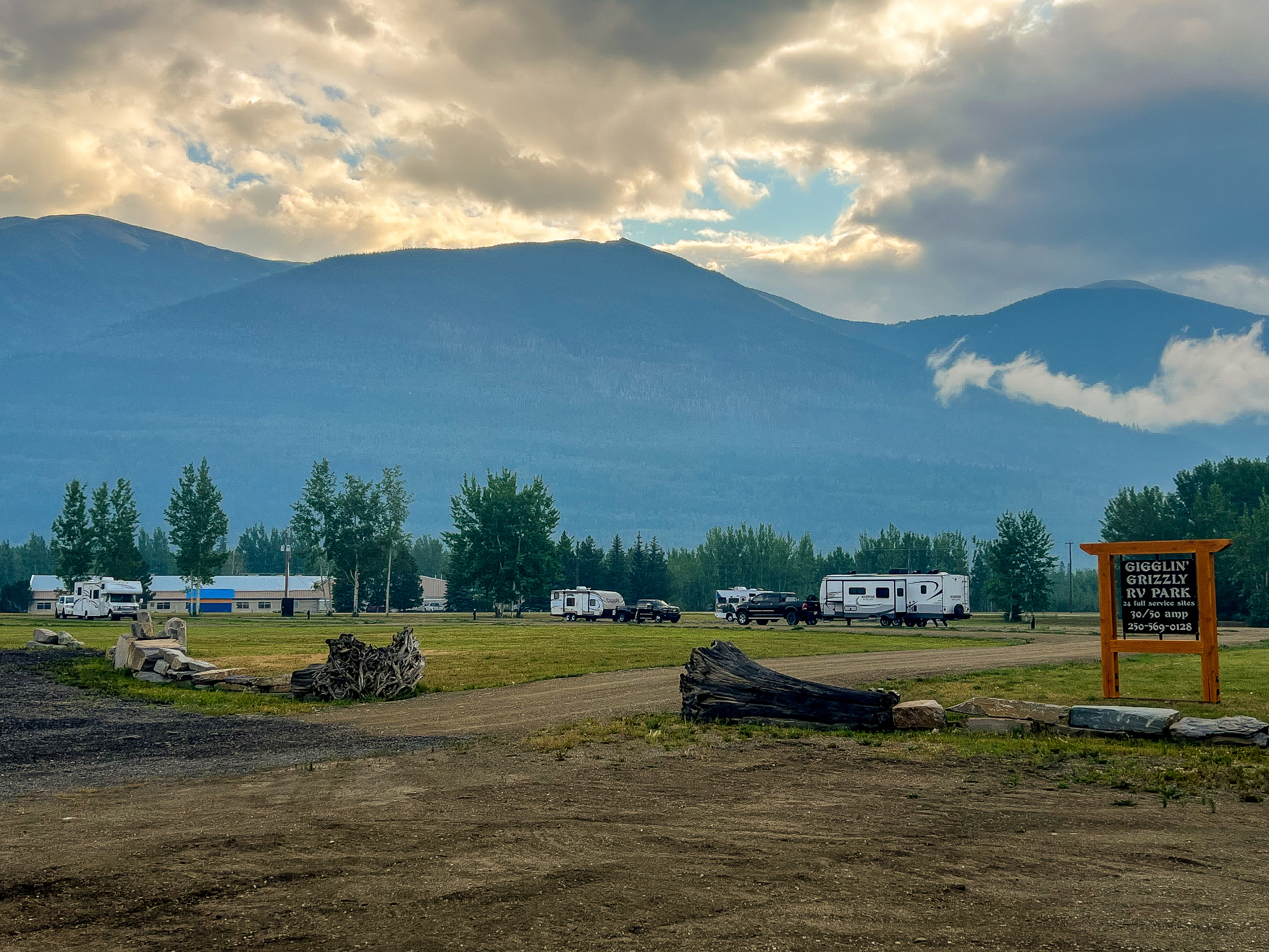 An RV campground before the mountain range