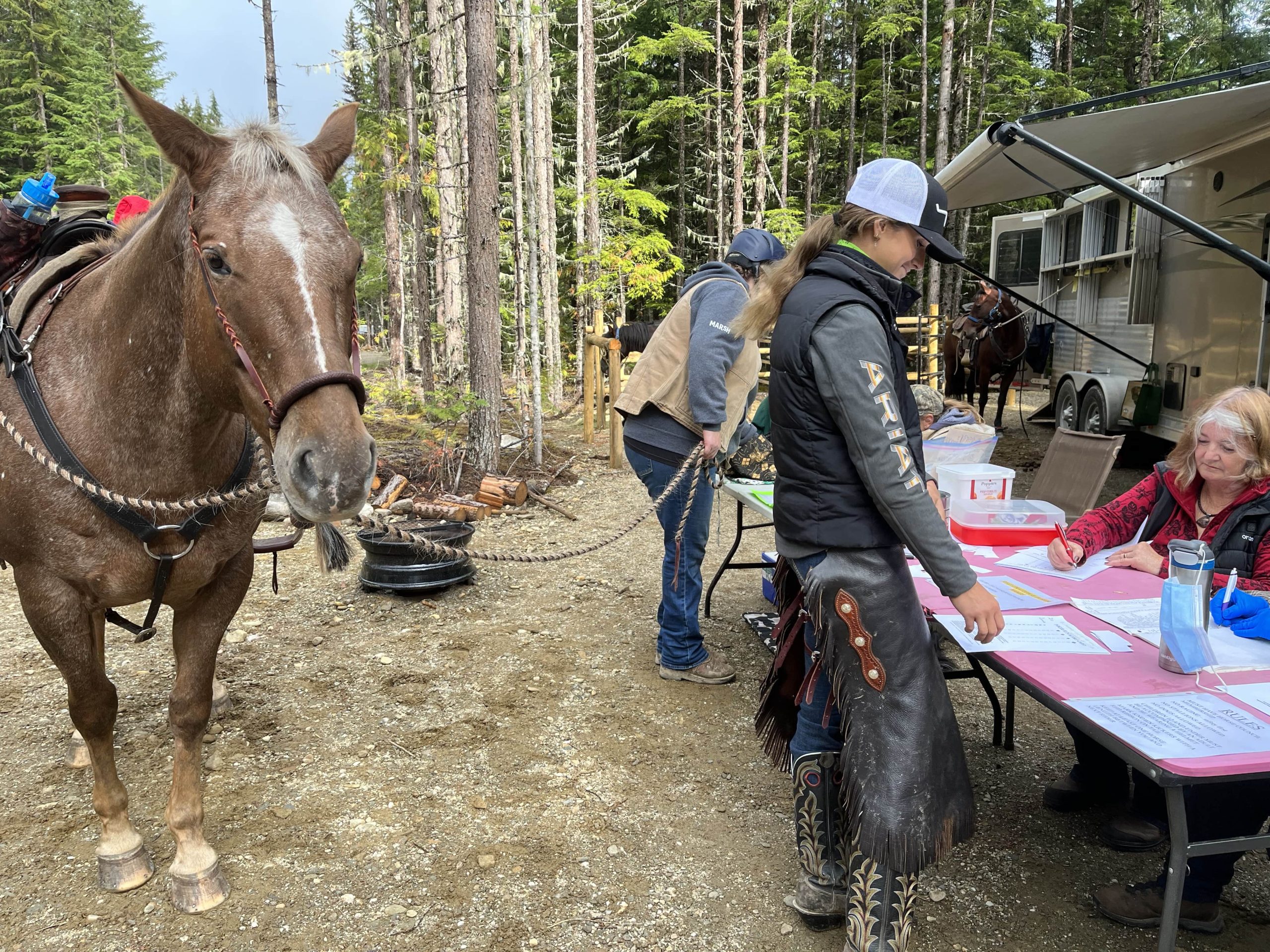 People with their horses at Poker Ride