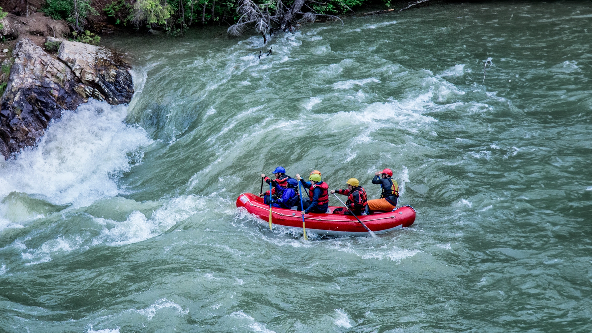 Six people whitewater rafting