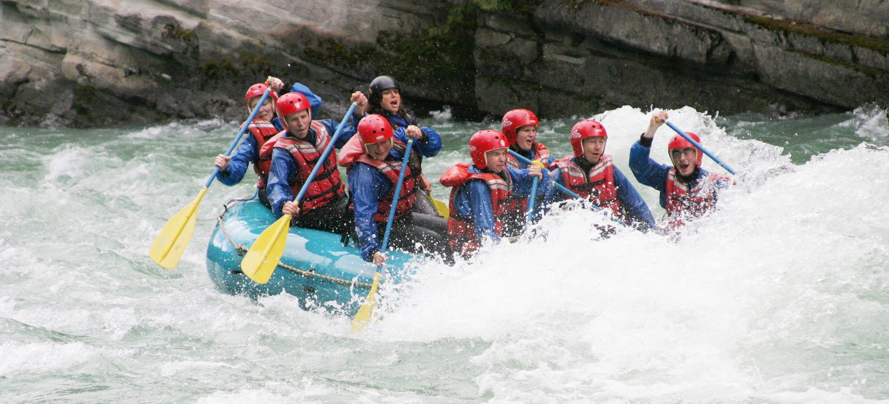People whitewater rafting